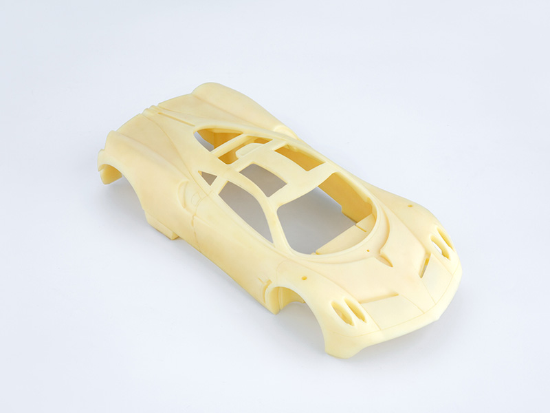 Modelo de coche producido en una sola pieza sin corte por fresado de 360°